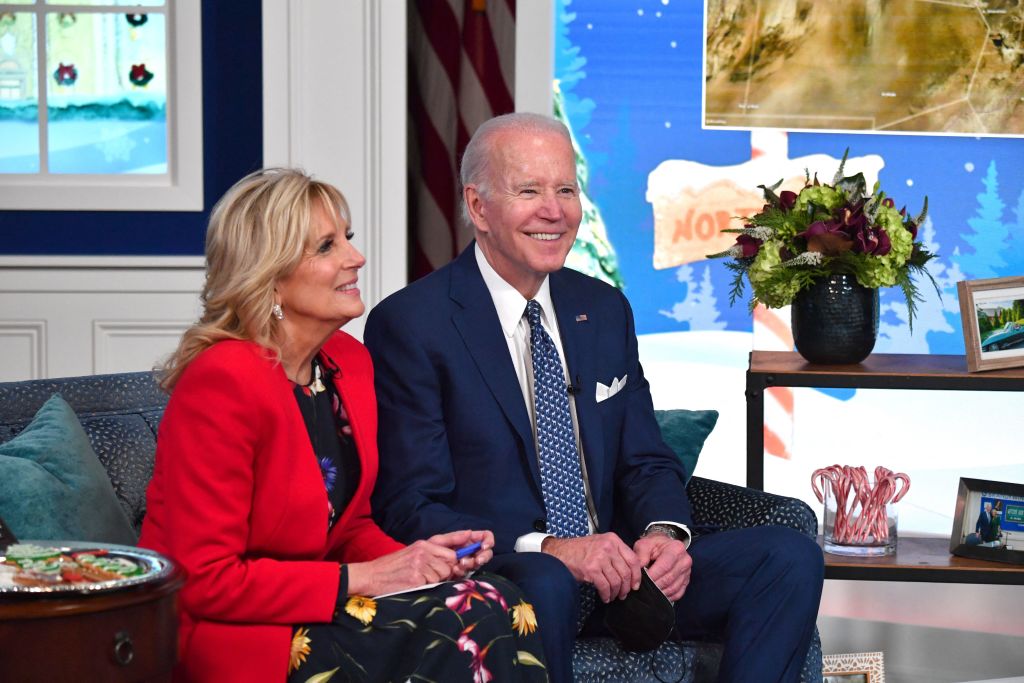 US President Joe Biden and First Lady Jill Biden speak with NORAD (North American Aerospace Defense Command) from the South Auditorium of the White House in Washington, DC.